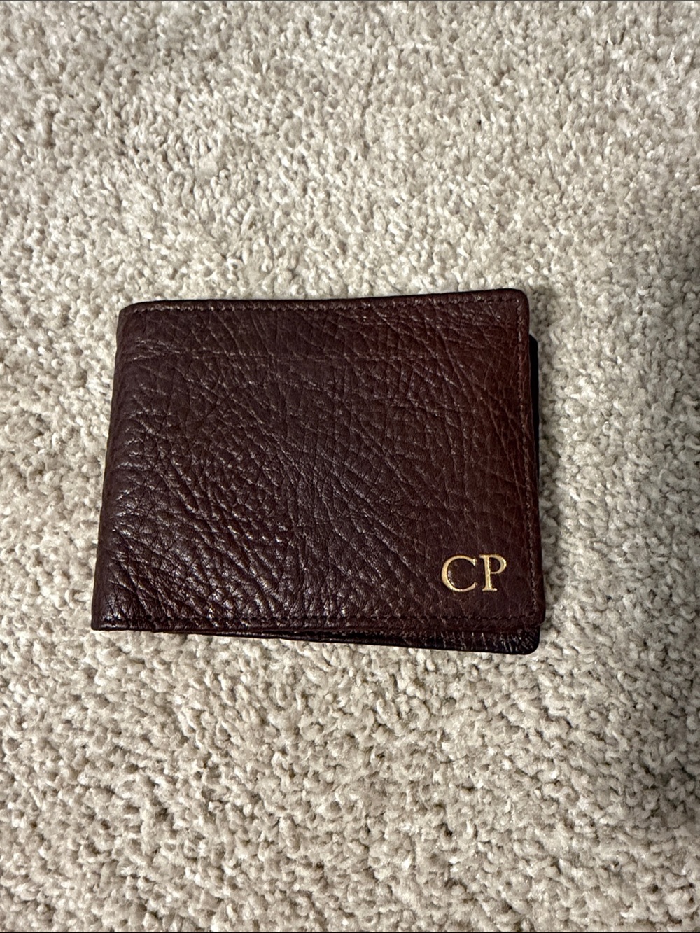 Monogrammed CP Brown Leather Men's Bifold Wallet with flap.